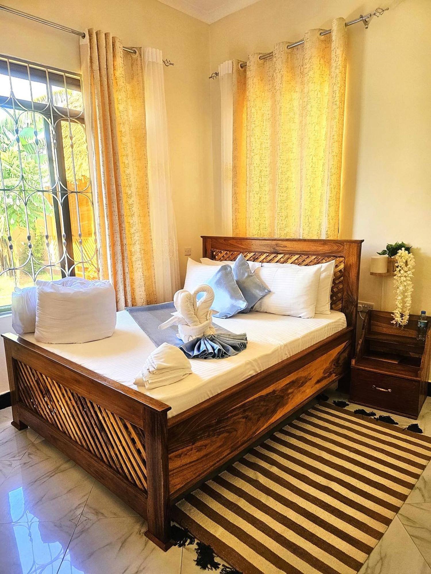 Boma la Ngombe Safi House Bed & Breakfast エクステリア 写真